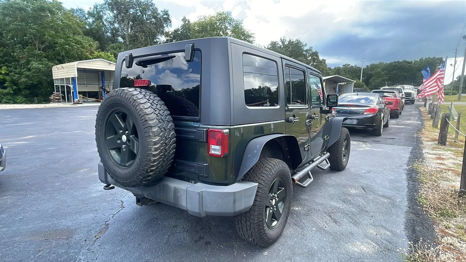 Used 2010 Jeep Wrangler Unlimited Rubicon w/ Dual Top Group AWD/4WD image 7