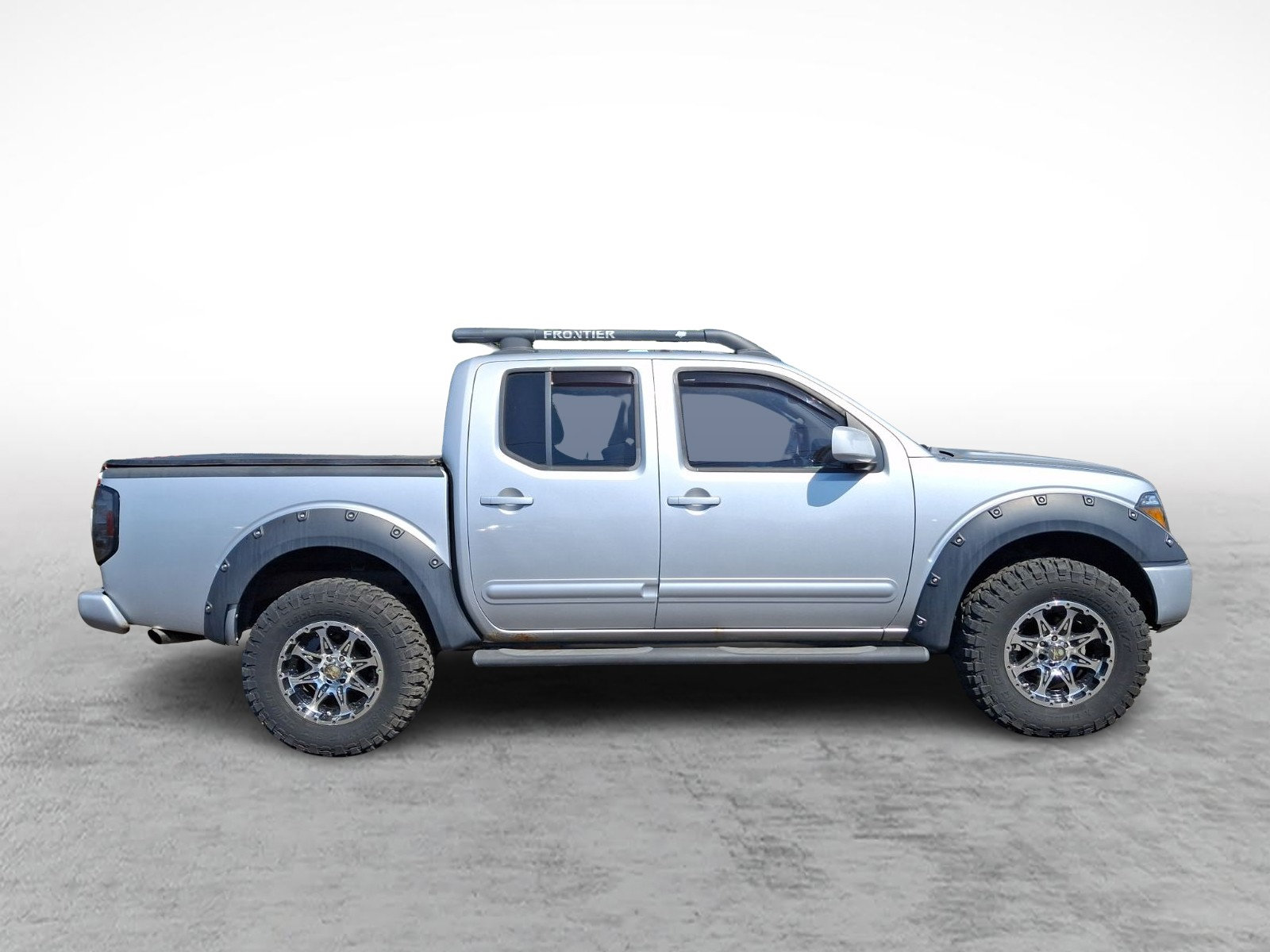 Used 2006 Nissan Frontier LE AWD/4WD image 6