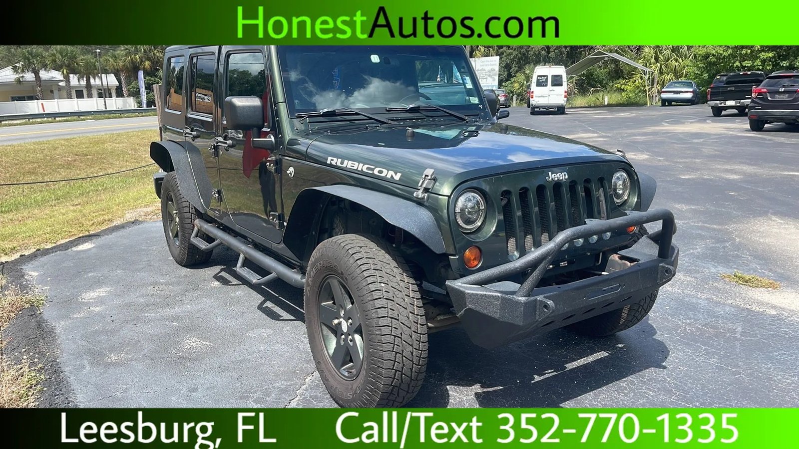 Used 2010 Jeep Wrangler Unlimited Rubicon w/ Dual Top Group AWD/4WD image 1