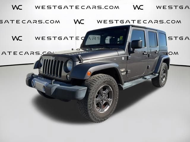 Used 2014 Jeep Wrangler Unlimited Sahara w/ Max Tow Package AWD/4WD image 1