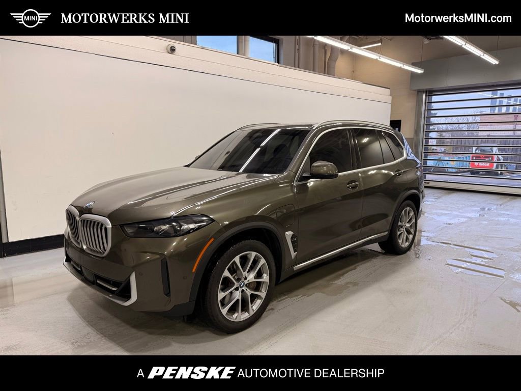 Used 2024 BMW X5 xDrive50e w/ Parking Assistance Package image 1