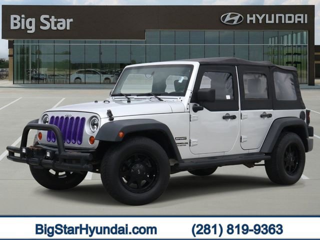 Used 2010 Jeep Wrangler Unlimited Sport w/ Black Appearance Group image 1