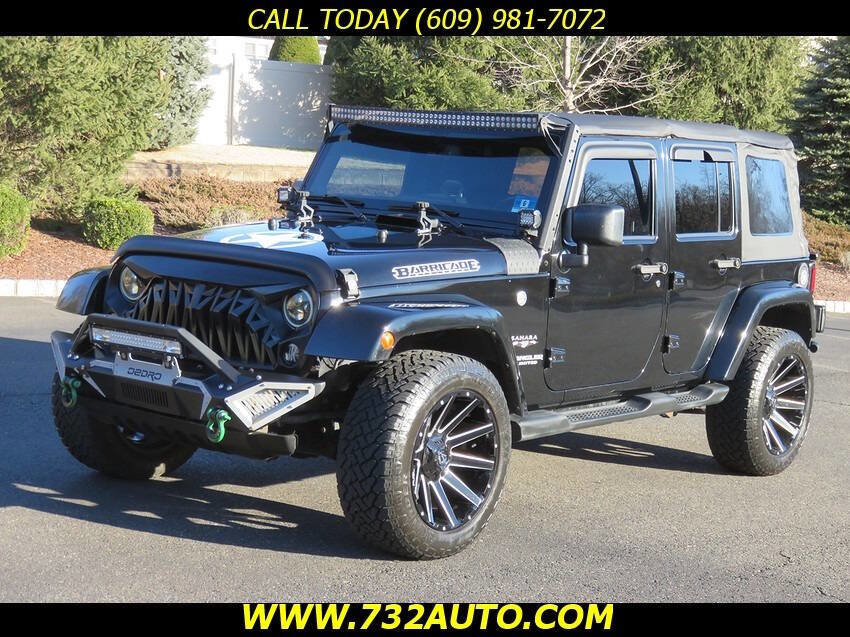 Used 2014 Jeep Wrangler Unlimited Sahara