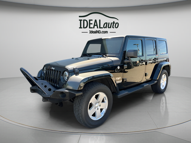 Used 2012 Jeep Wrangler Unlimited Sahara w/ Dual Top Group AWD/4WD image 6
