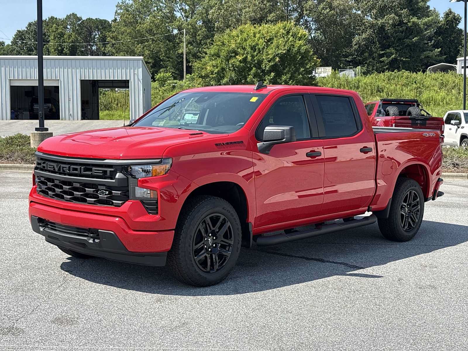 New 2026 Chevrolet Silverado 1500 Custom w/ Turbomax Blackout Package AWD/4WD image 2