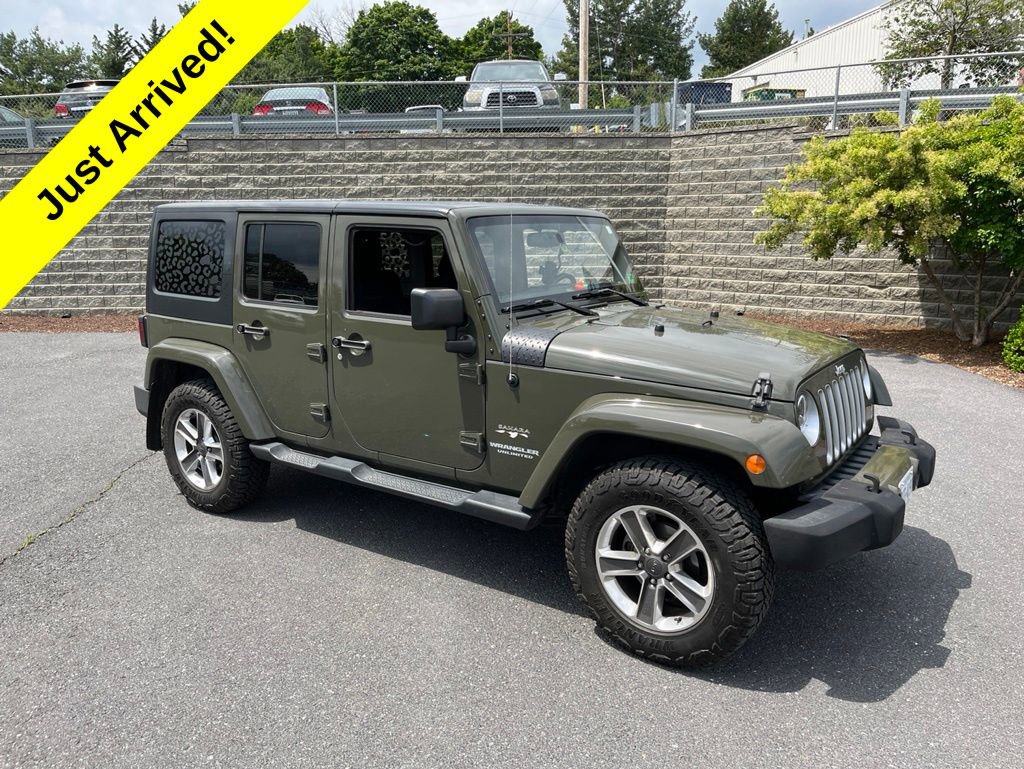 Used 2016 Jeep Wrangler Unlimited Sahara w/ Dual Top Group AWD/4WD image 1