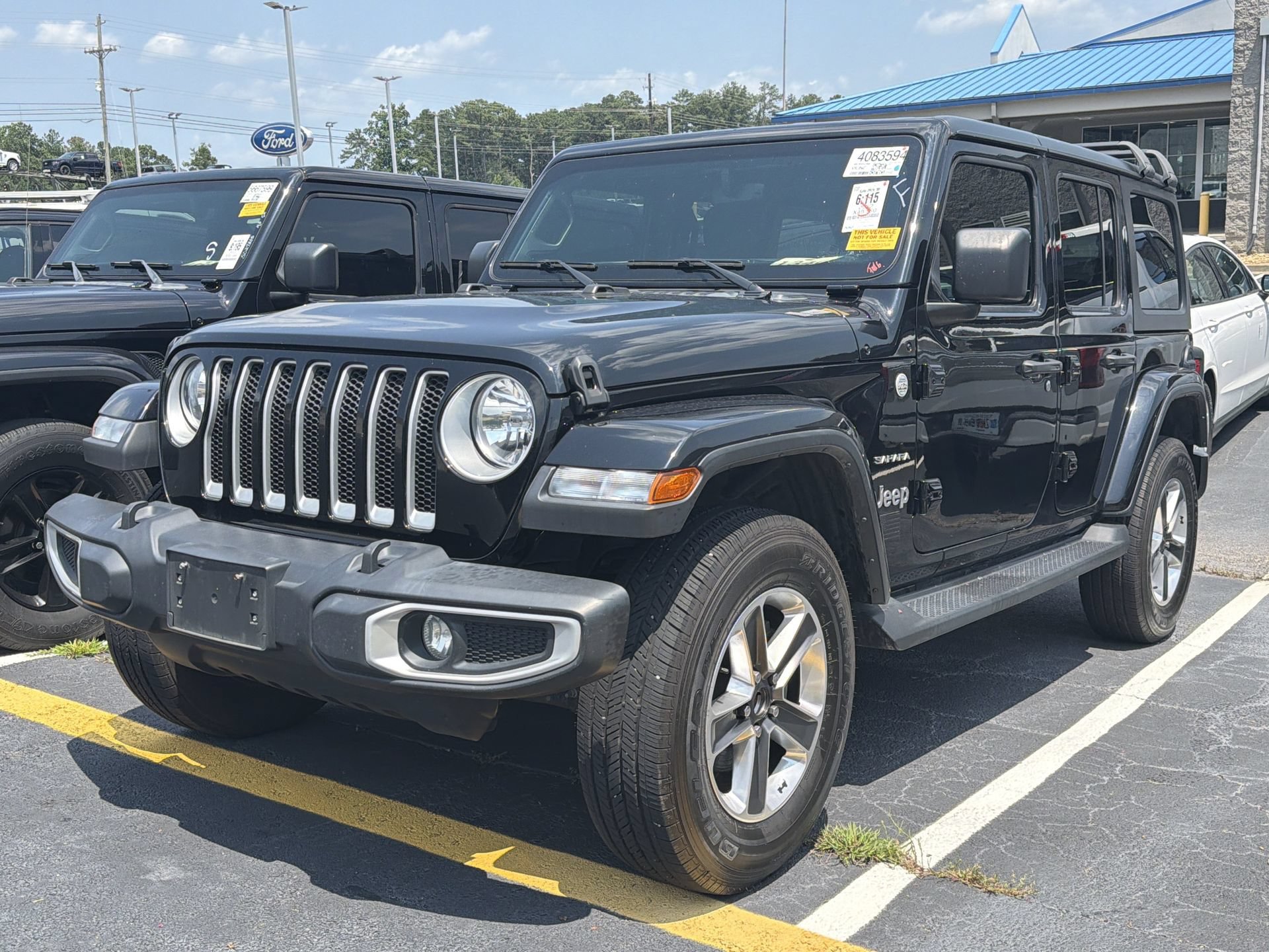 Used 2022 Jeep Wrangler Unlimited Sahara AWD/4WD image 1
