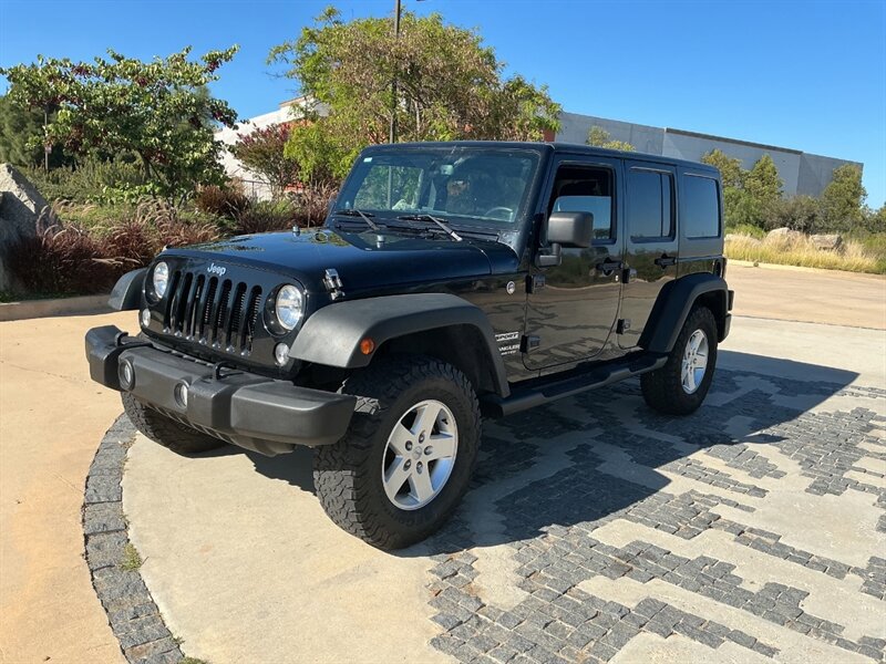 Used 2014 Jeep Wrangler Unlimited Sport w/ Quick Order Package 24S AWD/4WD image 1