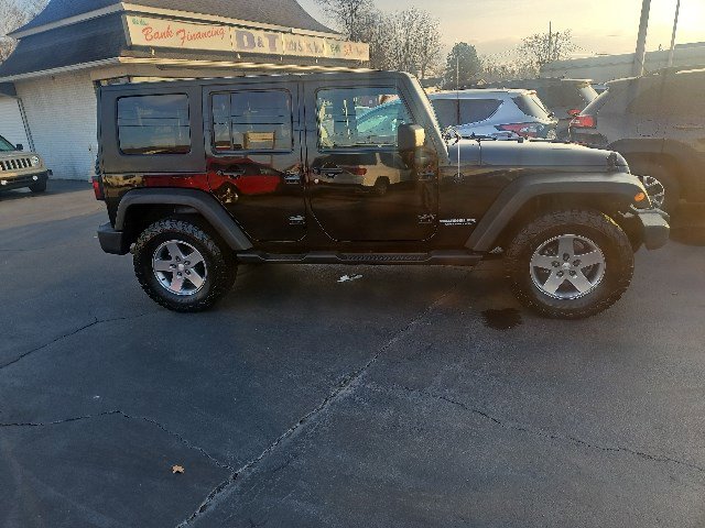 Used 2010 Jeep Wrangler Unlimited Rubicon w/ Dual Top Group AWD/4WD image 2