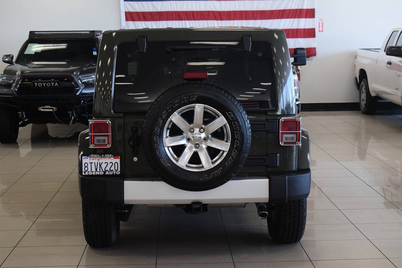 Used 2015 Jeep Wrangler Unlimited Sahara w/ Dual Top Group AWD/4WD image 28