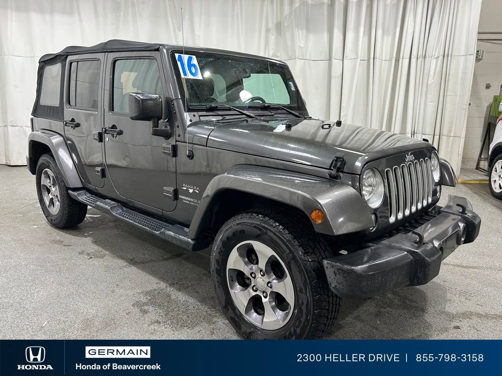 Used 2016 Jeep Wrangler Unlimited Sahara w/ Dual Top Group AWD/4WD image 1