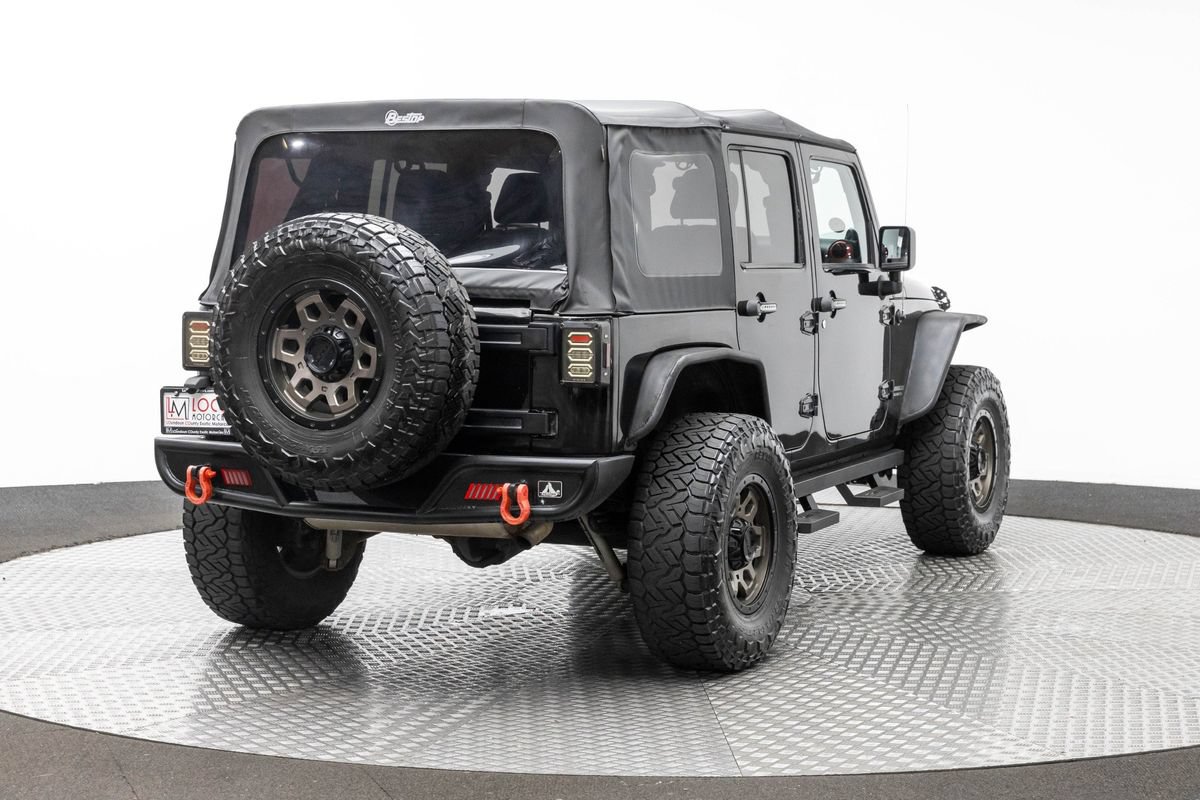 Used 2012 Jeep Wrangler Unlimited Rubicon w/ Dual Top Group AWD/4WD image 5