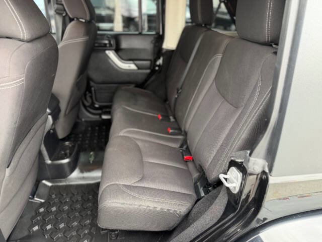 Used 2014 Jeep Wrangler Unlimited Sahara w/ Dual Top Group AWD/4WD image 14