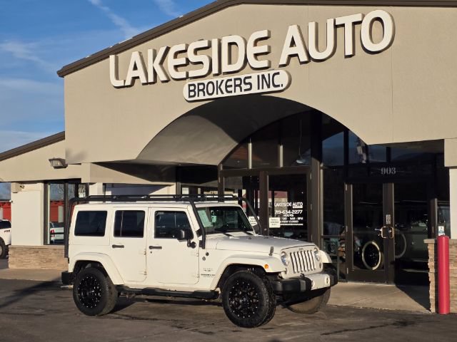 Used 2016 Jeep Wrangler Unlimited Sahara w/ Dual Top Group AWD/4WD image 2