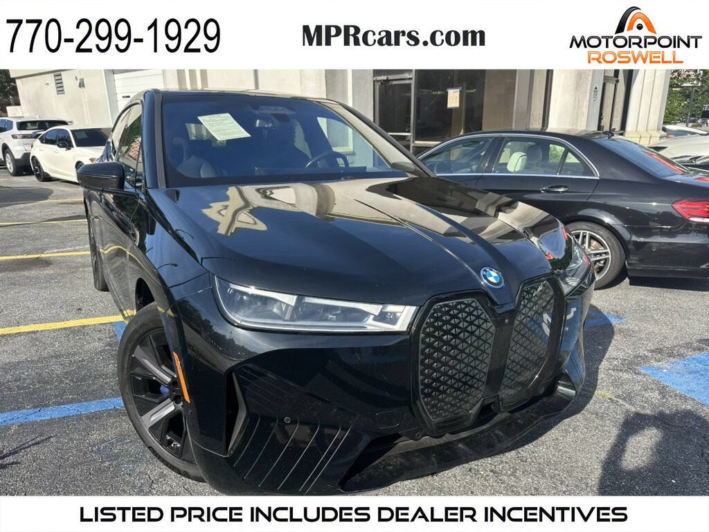 Used 2024 BMW iX xDrive50 w/ Premium Package AWD/4WD image 1