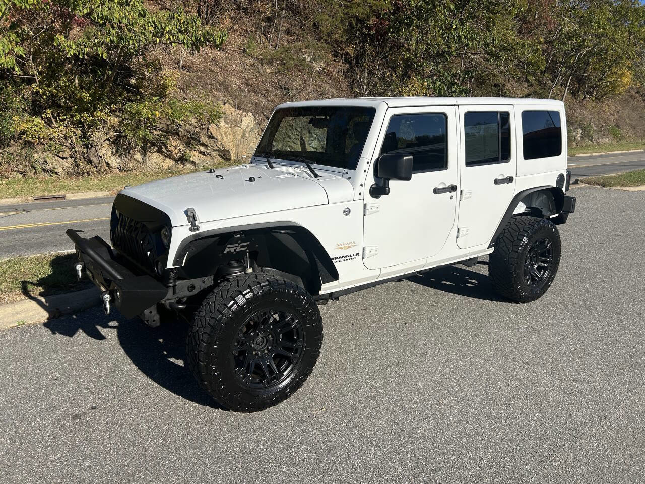 Used 2014 Jeep Wrangler Unlimited Sahara w/ Dual Top Group image 2