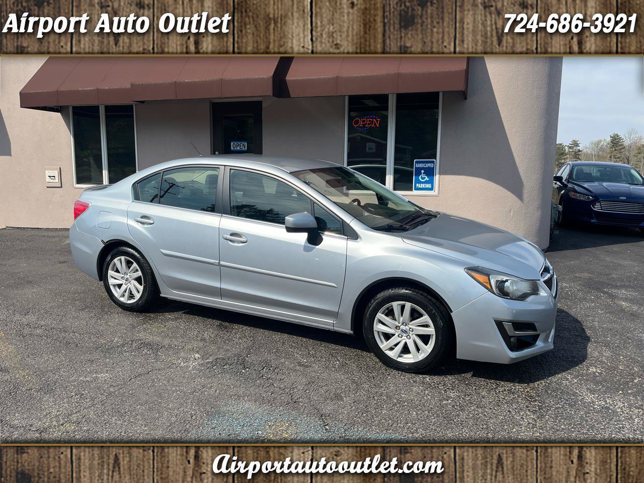 Used 2015 Subaru Impreza 2.0i Premium AWD/4WD image 1