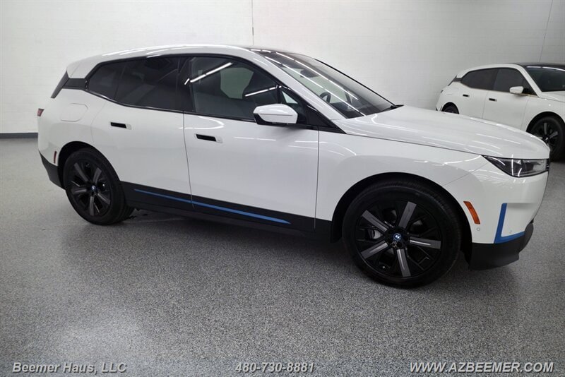 Used 2024 BMW iX xDrive50 w/ BMW I Signature Blue Package AWD/4WD image 14