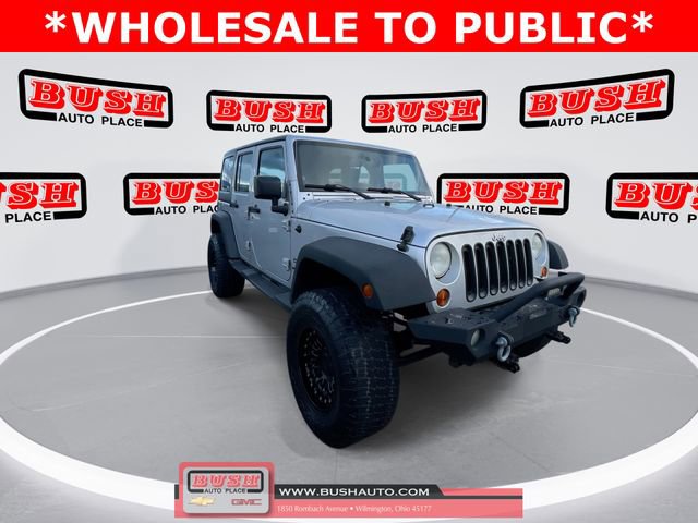 Used 2010 Jeep Wrangler Unlimited Sport image 1