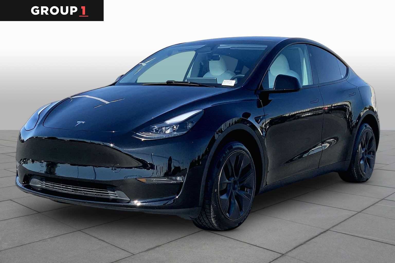 Used 2024 Tesla Model Y Long Range AWD/4WD image 1