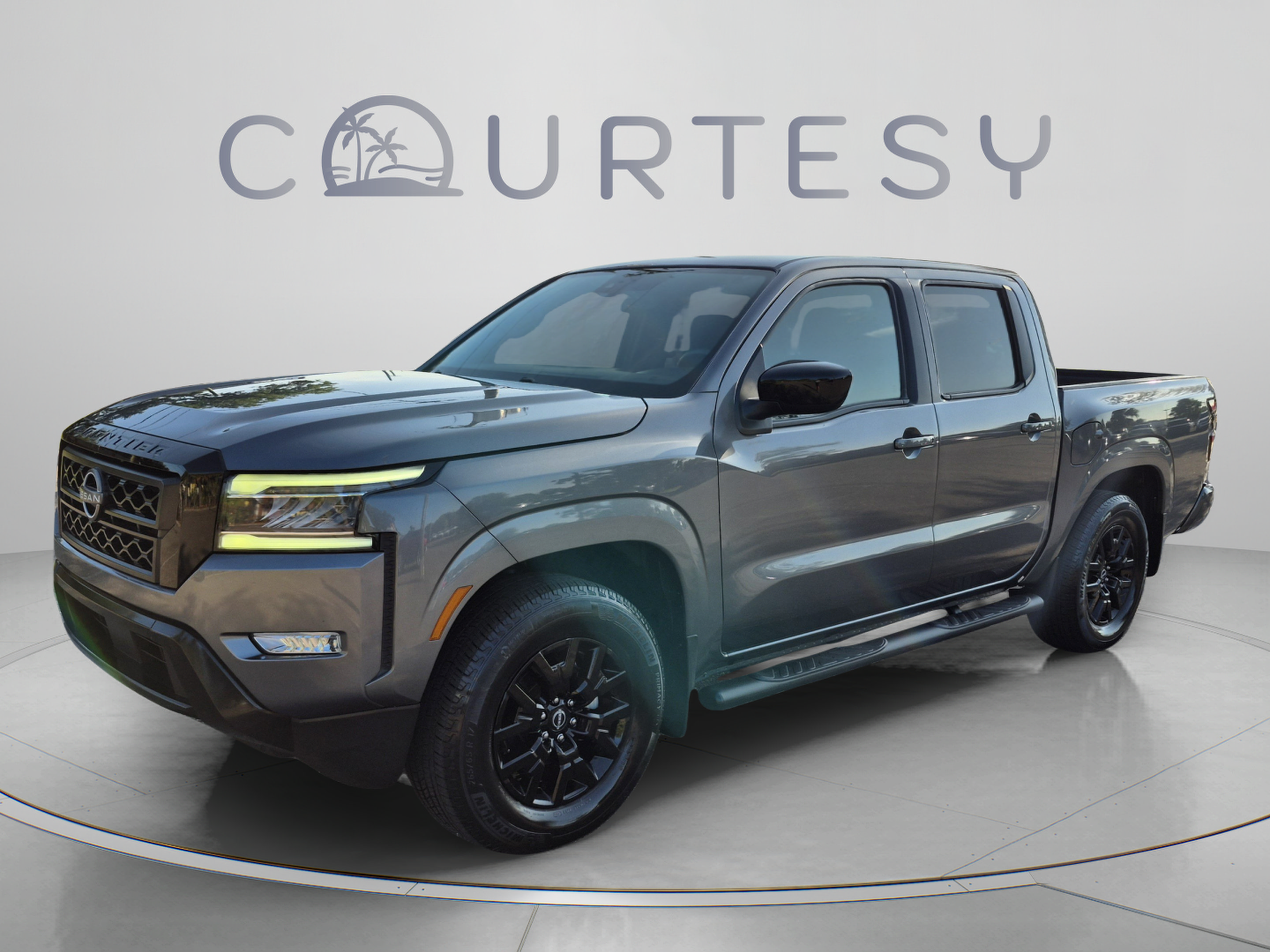 Used 2023 Nissan Frontier SV w/ Midnight Edition Package RWD image 1