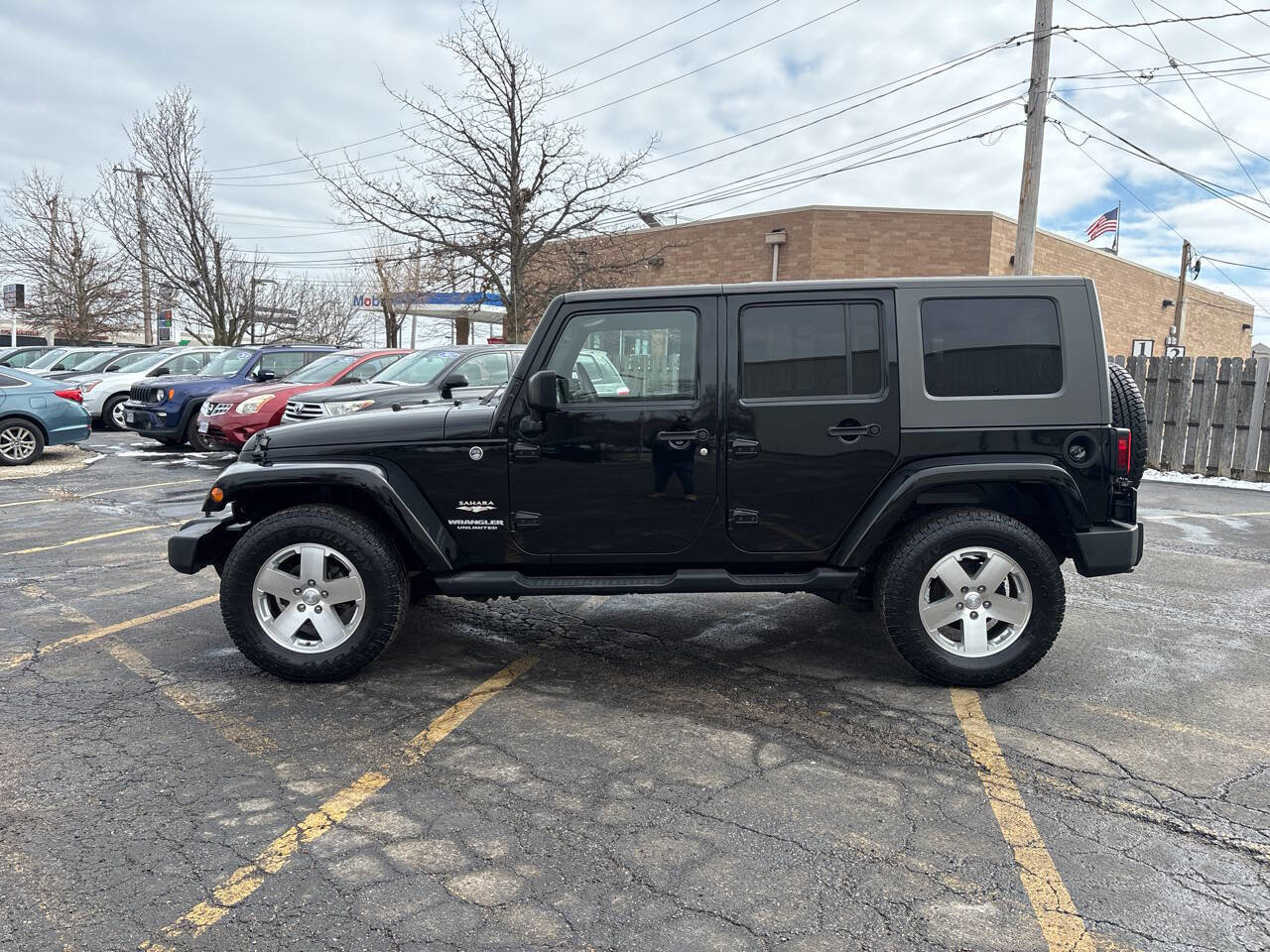 Used 2009 Jeep Wrangler Unlimited Sahara w/ Dual Top Group image 2