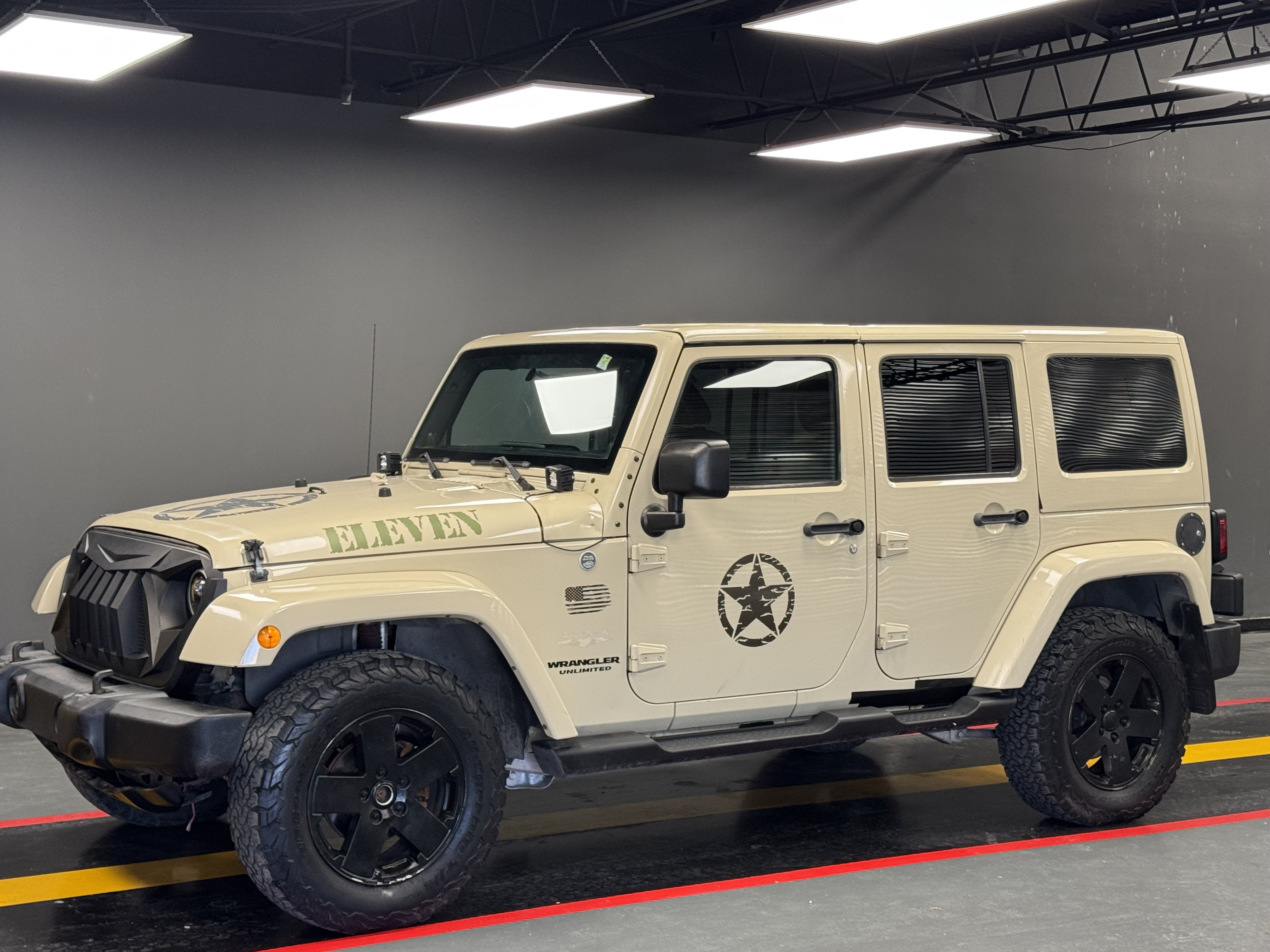 Used 2011 Jeep Wrangler Unlimited Sahara w/ Mopar Chrome Edition Group AWD/4WD image 1
