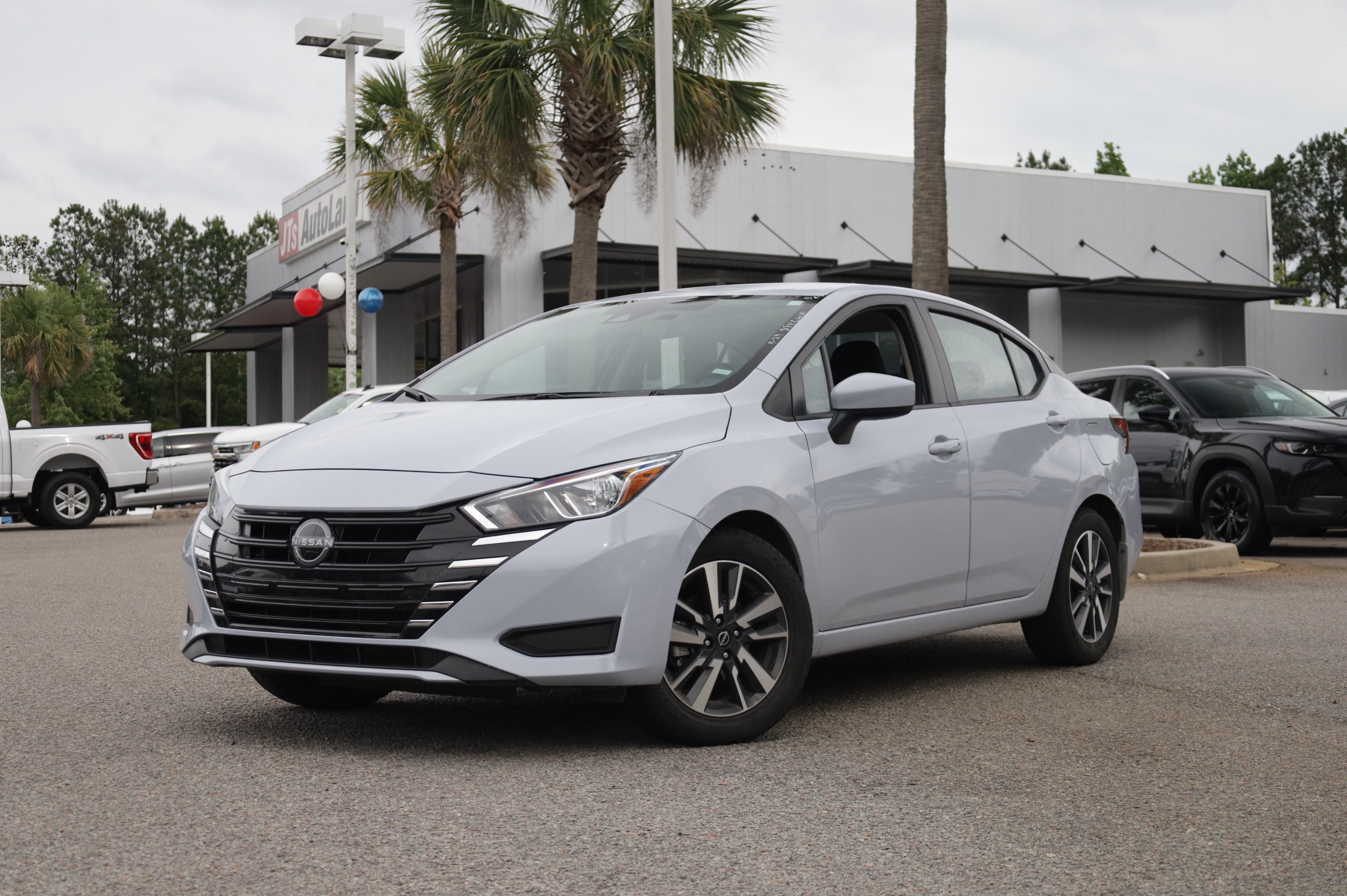 Used 2024 Nissan Versa SV w/ Trunk Package FWD image 1