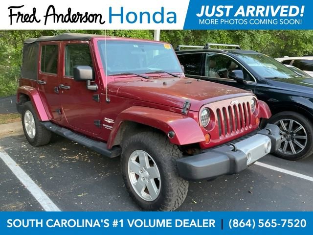 Used 2012 Jeep Wrangler Unlimited Sahara w/ Max Tow Pkg AWD/4WD image 1