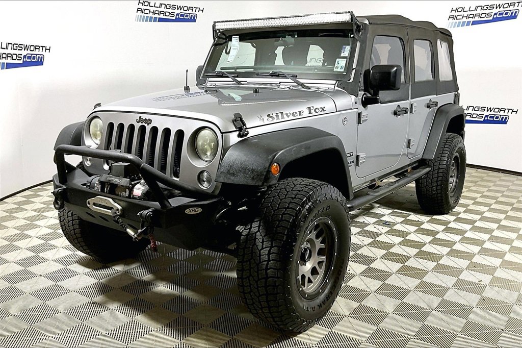 Used 2016 Jeep Wrangler Unlimited Sport image 1