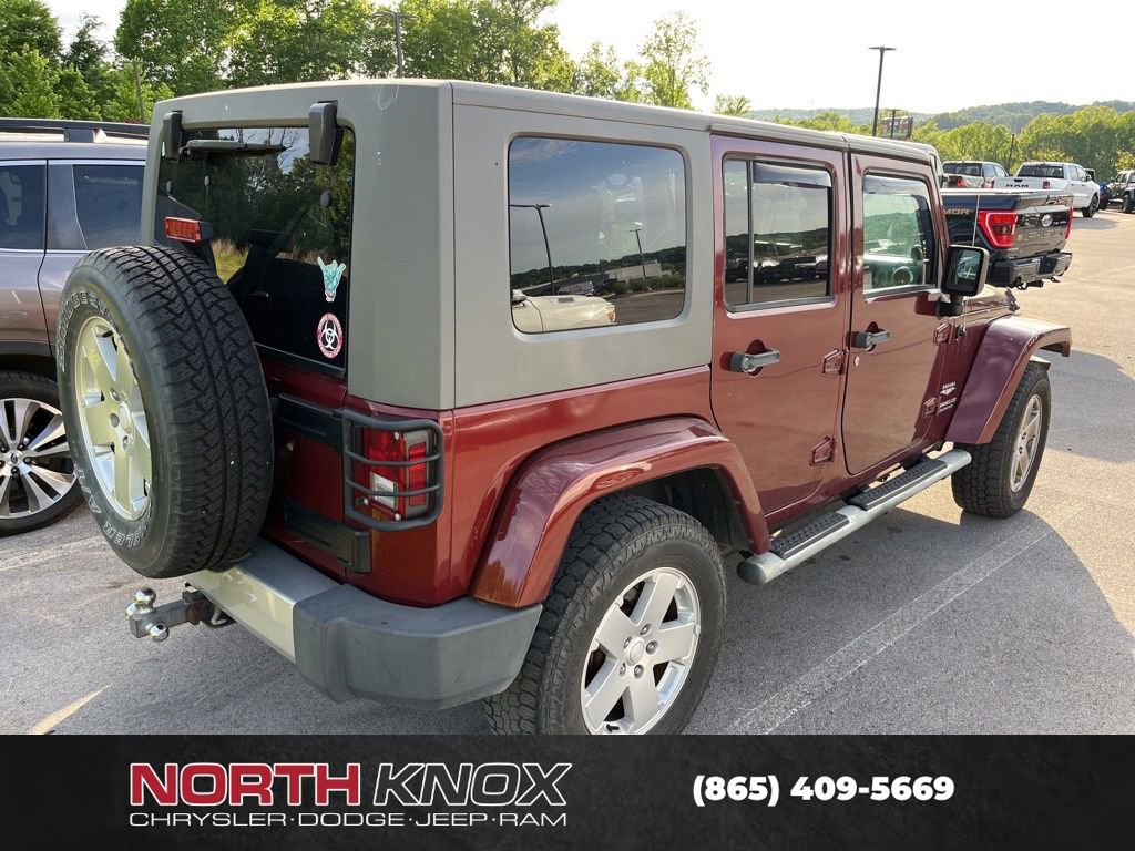 Used 2010 Jeep Wrangler Unlimited Sahara w/ Dual Top Group AWD/4WD image 2