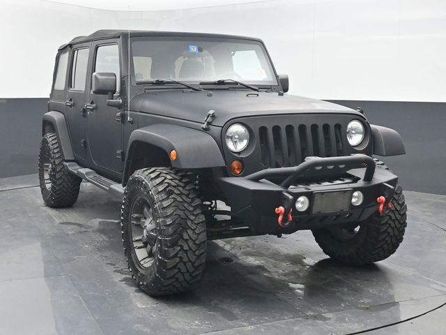 Used 2012 Jeep Wrangler Unlimited Sahara AWD/4WD image 1