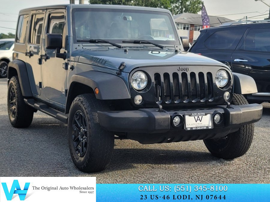 Used 2015 Jeep Wrangler Unlimited Sport w/ Dual Top Group