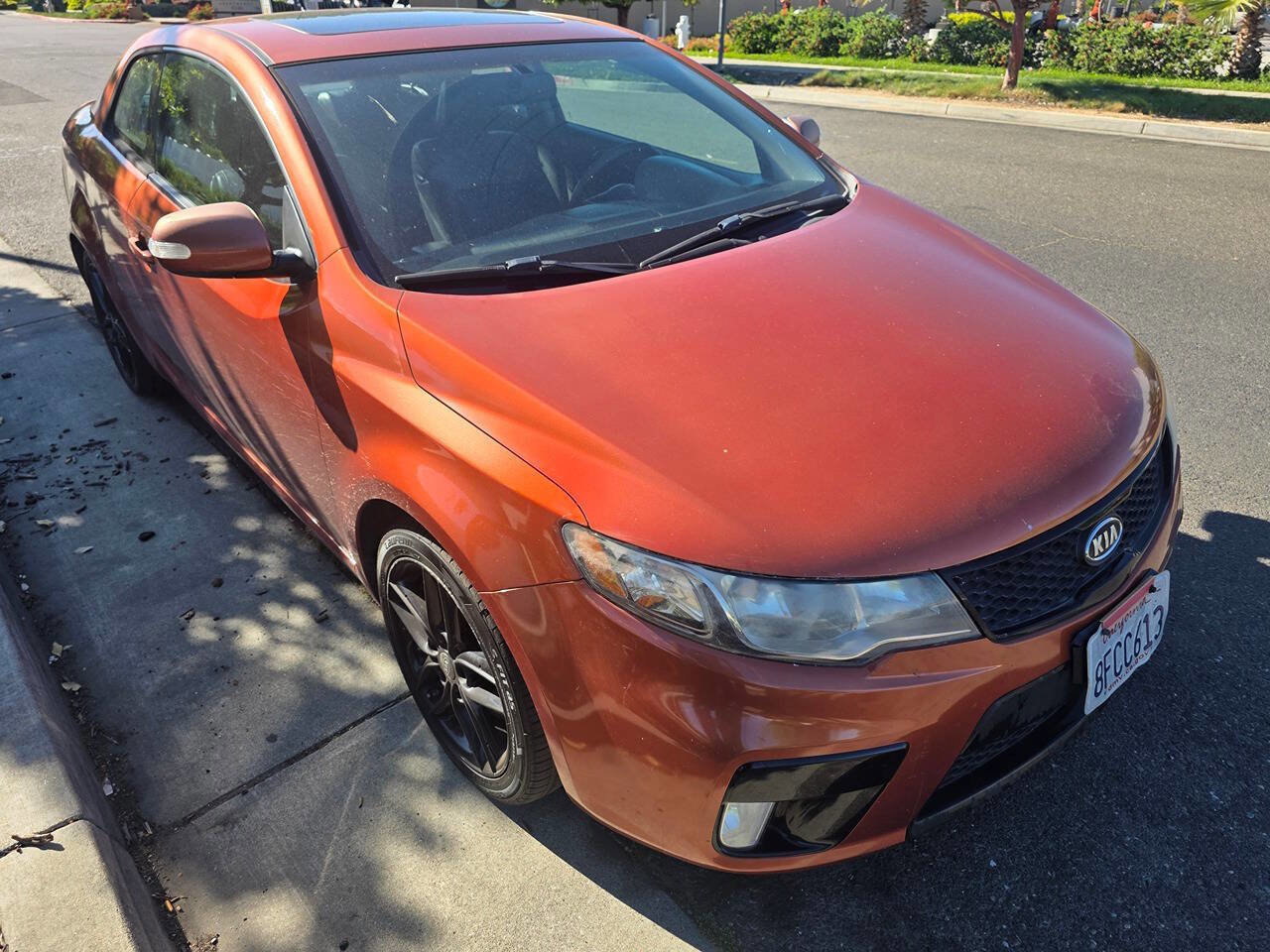 Used 2010 Kia Forte Koup SX w/ Leather Pkg FWD image 1