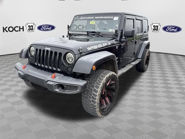 Used 2011 Jeep Wrangler Unlimited Sahara w/ Dual Top Group AWD/4WD image 3