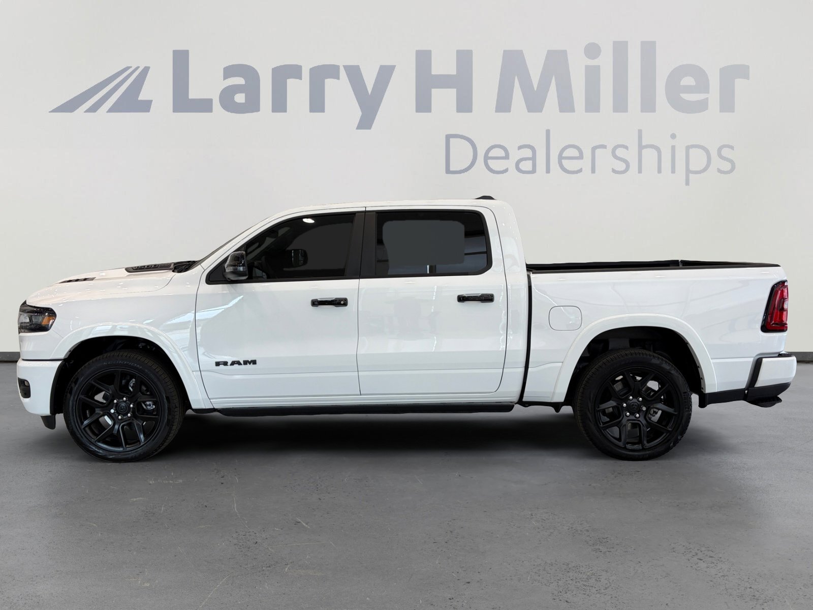 Used 2025 RAM 1500 Laramie w/ Night Edition AWD/4WD image 2