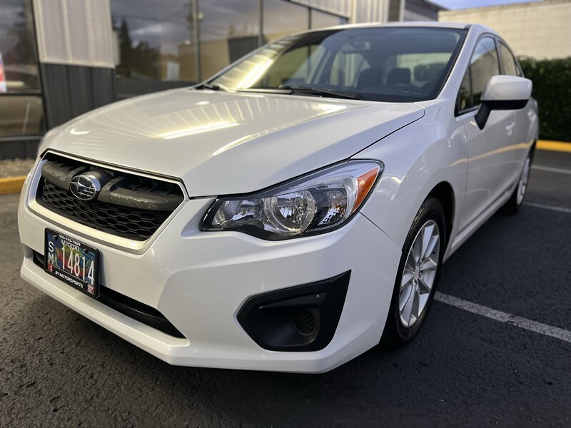 Used 2014 Subaru Impreza 2.0i Premium AWD/4WD image 1