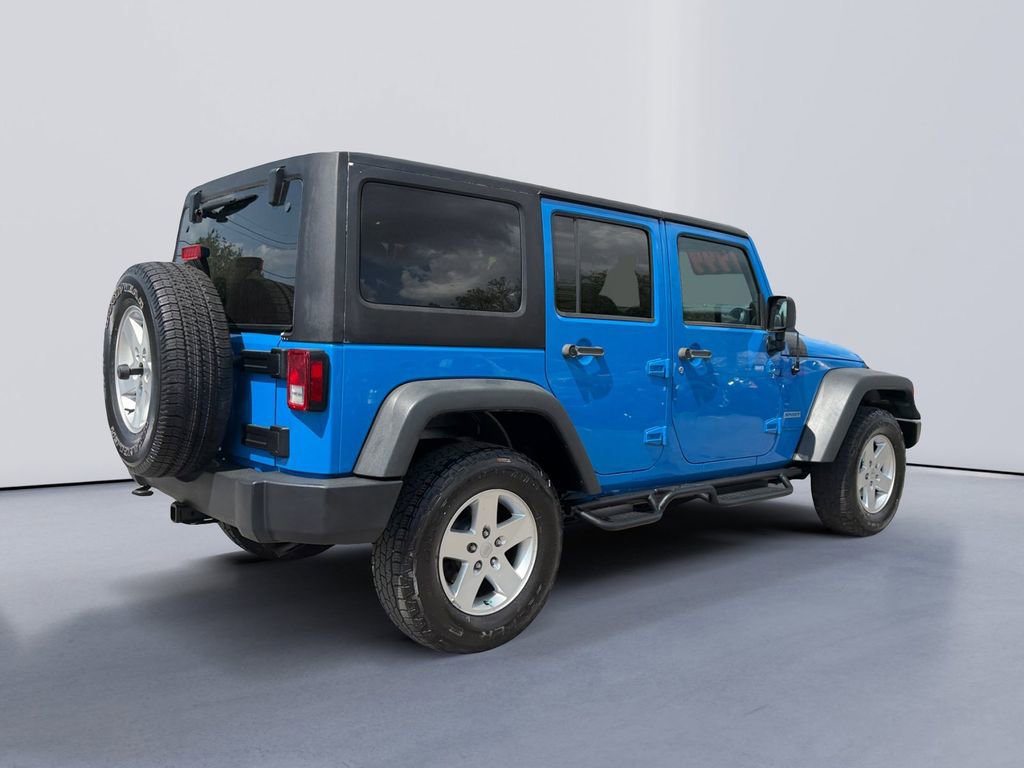Used 2012 Jeep Wrangler Unlimited Sport AWD/4WD video 3