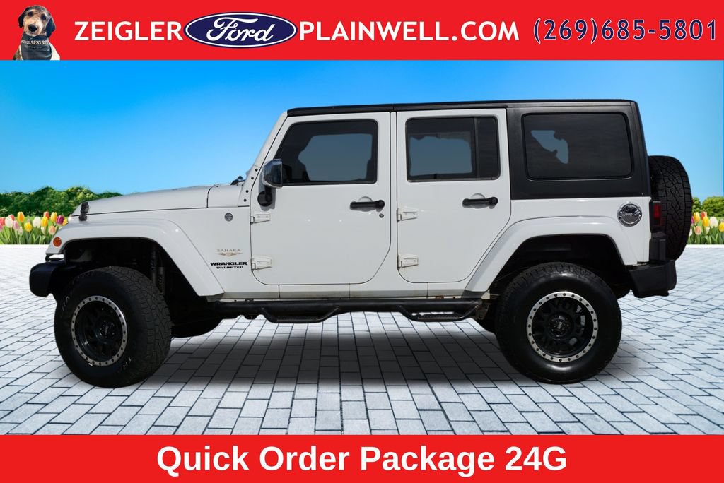 Used 2012 Jeep Wrangler Unlimited Sahara w/ Dual Top Group AWD/4WD image 2