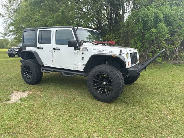 Used 2012 Jeep Wrangler Unlimited Sport AWD/4WD image 10