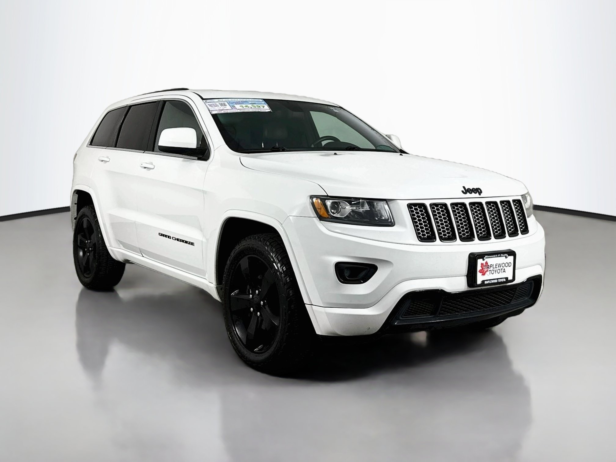 Used 2015 Jeep Grand Cherokee Altitude AWD/4WD image 1