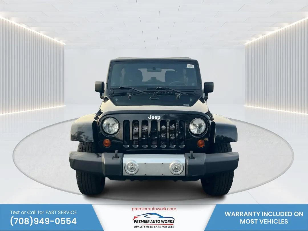 Used 2012 Jeep Wrangler Unlimited Sahara w/ Connectivity Group AWD/4WD image 2