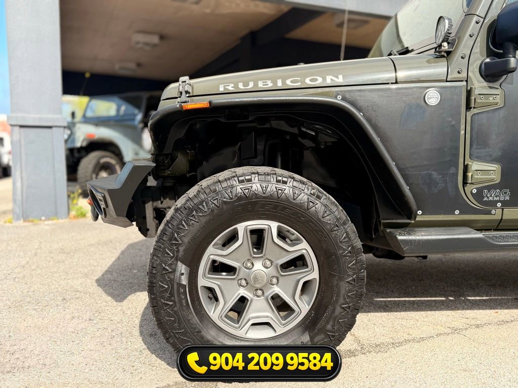 Used 2015 Jeep Wrangler Unlimited Rubicon w/ Dual Top Group AWD/4WD image 12