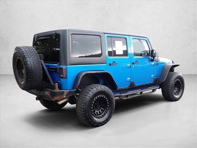Used 2015 Jeep Wrangler Unlimited Rubicon w/ Connectivity Group AWD/4WD video 4