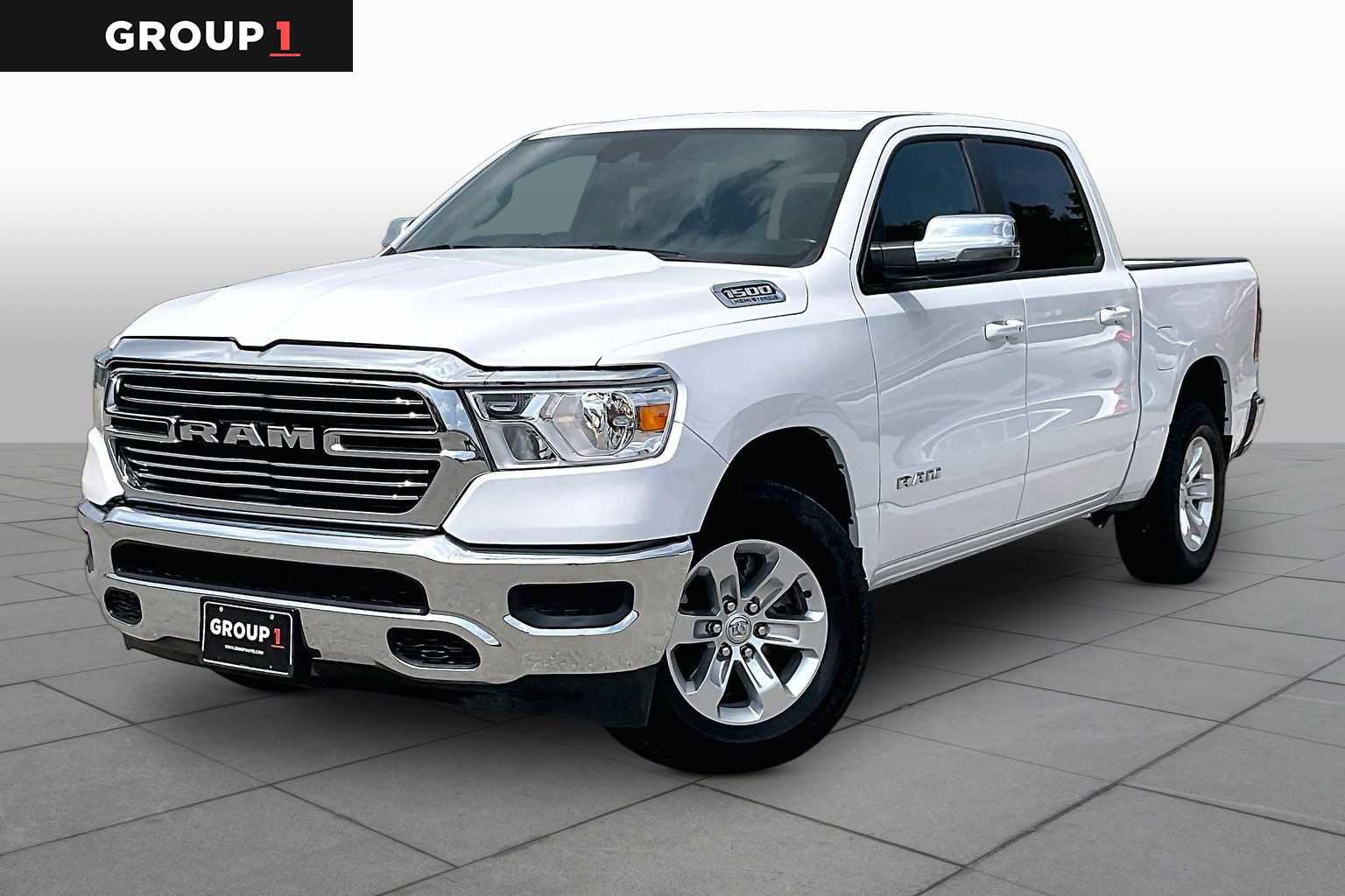 Used 2024 RAM 1500 Laramie AWD/4WD image 1