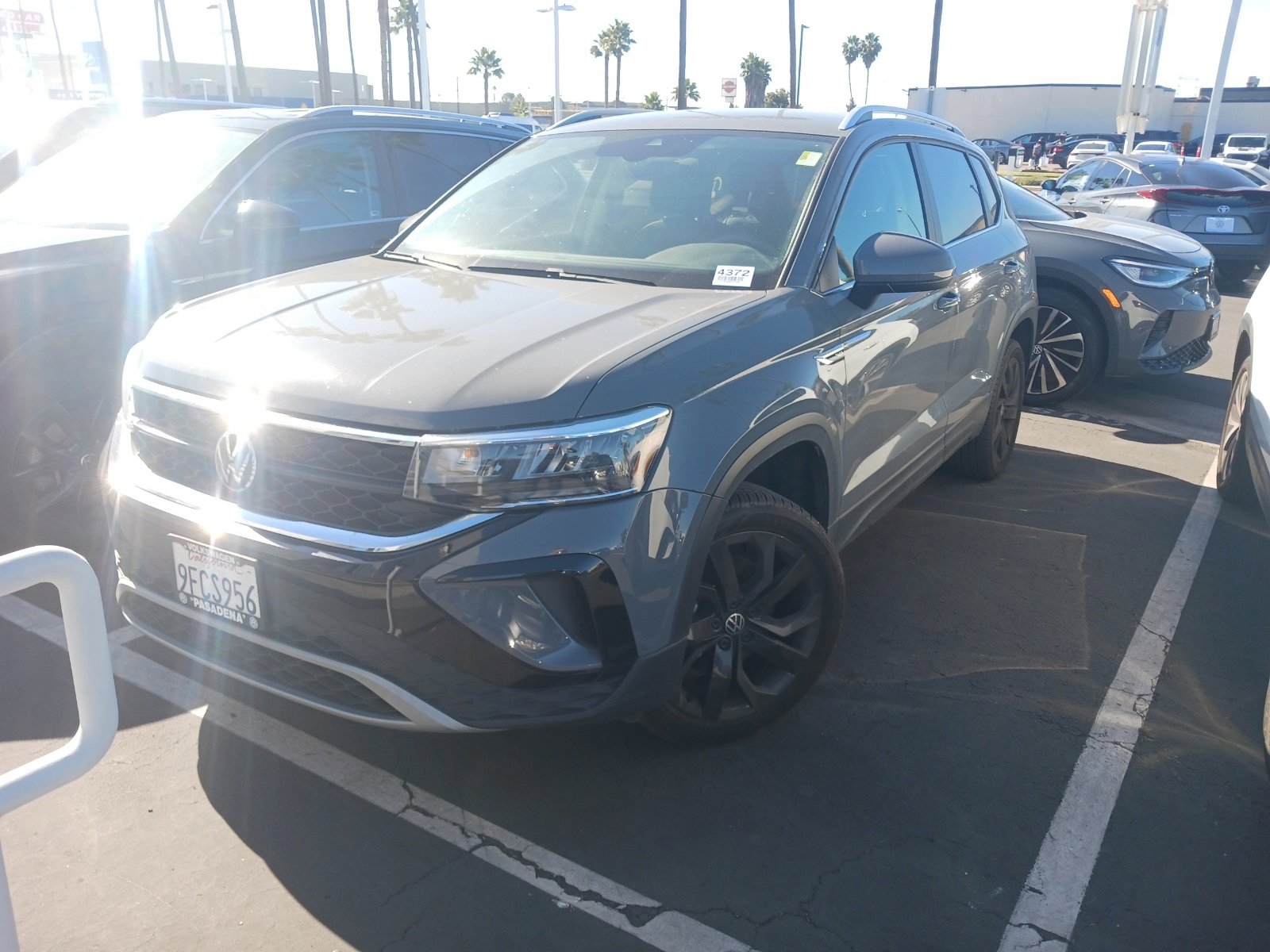 Used 2023 Volkswagen Taos SE w/ Black Wheel Package