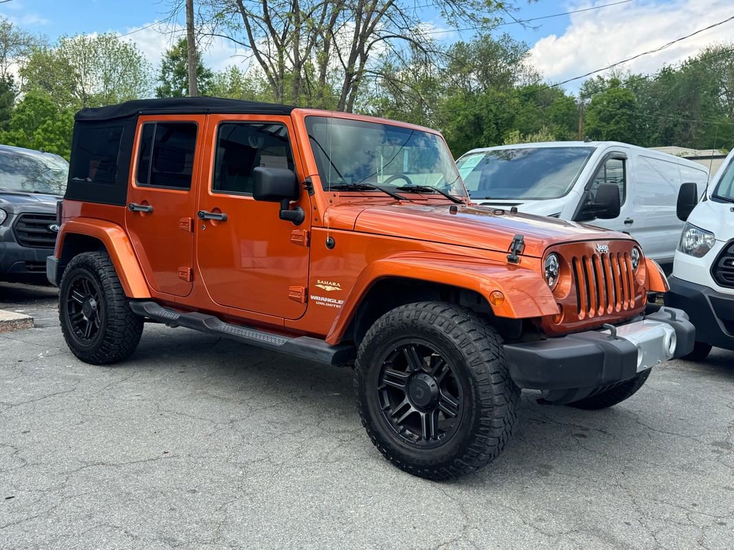 Used 2010 Jeep Wrangler Unlimited Sahara w/ Dual Top Group AWD/4WD image 2