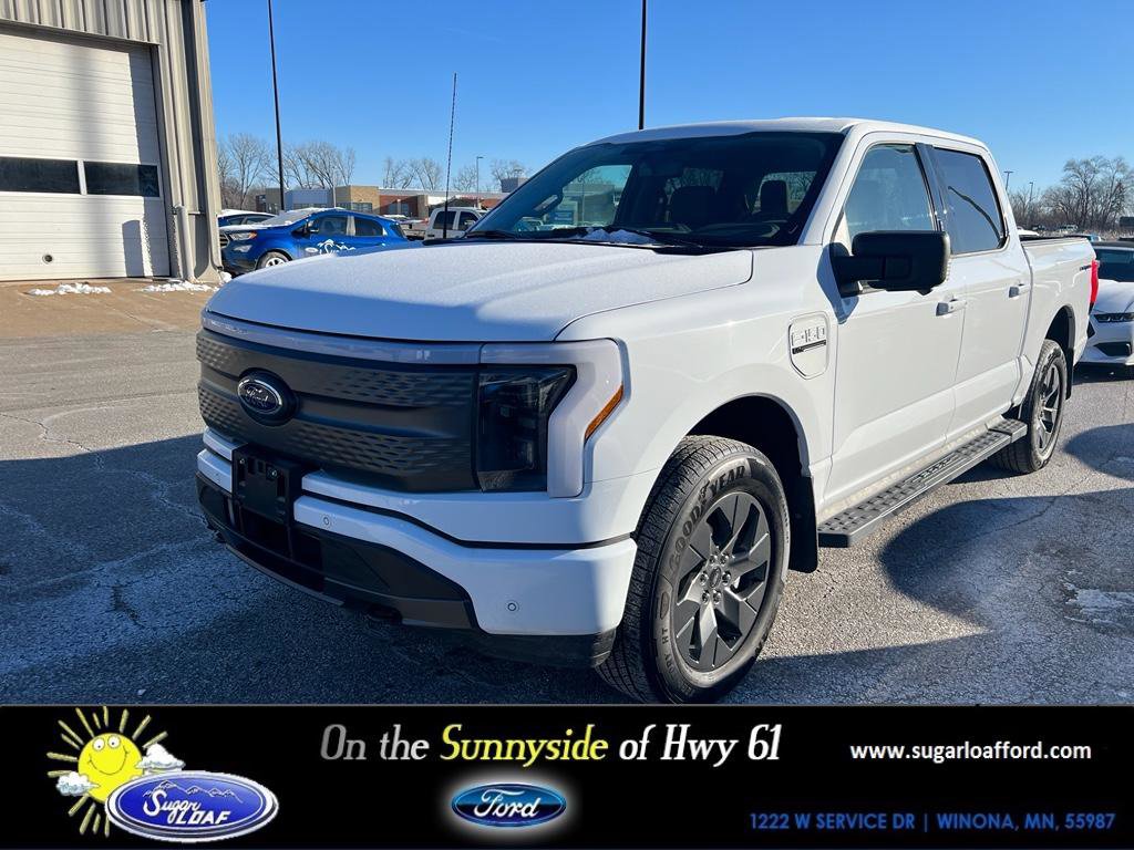 Used 2023 Ford F150 Lightning XLT w/ Equipment Group 312A High image 1