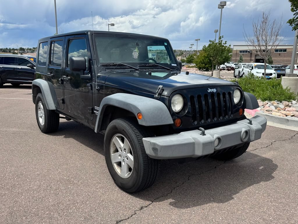 Used 2013 Jeep Wrangler Unlimited Sport AWD/4WD image 1