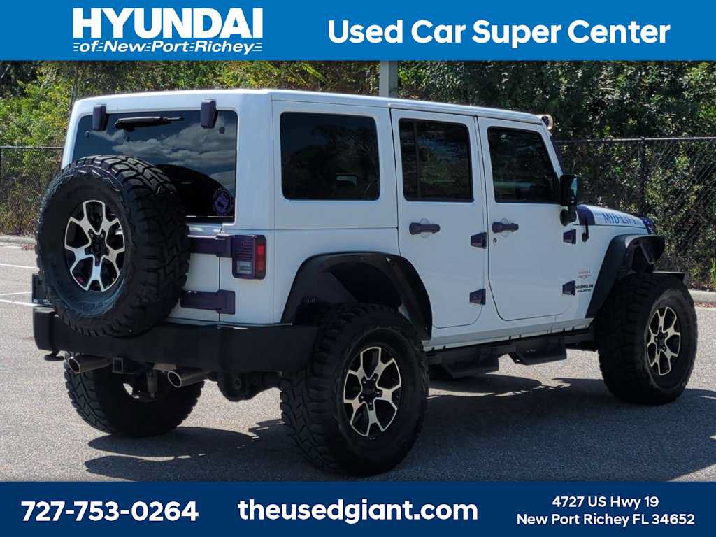 Used 2014 Jeep Wrangler Unlimited Sahara w/ Dual Top Group AWD/4WD image 5